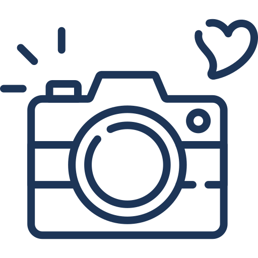 Line drawing of a camera with a heart symbol.